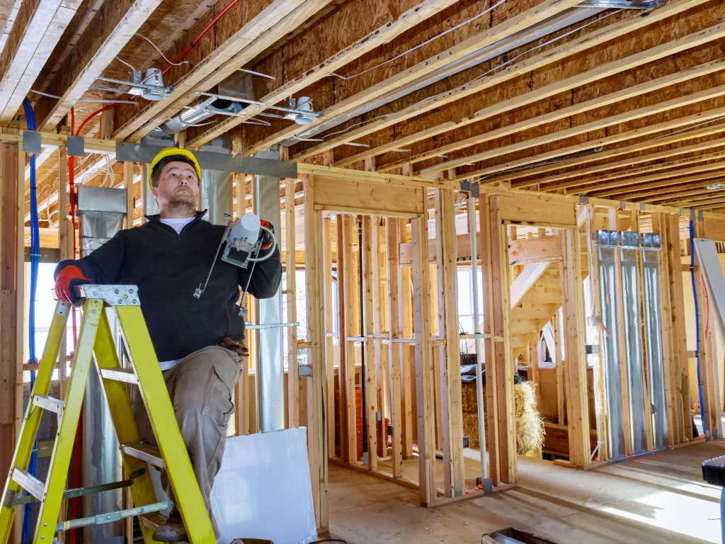 Benchmark Home Services electrician helping with residential electrical services in the Seattle region